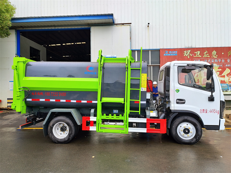 國六7方 藍(lán)牌東風(fēng)D6 側(cè)裝壓縮垃圾車